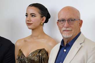St. Clair e Gibney posando para fotos de "Musk" no Festival Internacional de Cinema de Veneza