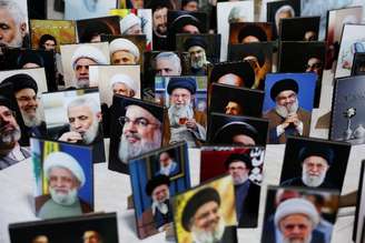 Retratos de líderes atuais e antigos do Irã e do Hezbollah exibidos no festival Proud Dahiyeh, nos subúrbios ao sul de Beirute, Líbano
2 de setembro de 2026
REUTERS/Mohamed Azakir