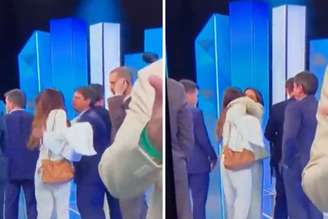 Andréia Sadi abraça integrantes da comitiva de Flávio após debate