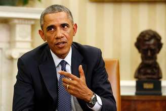 O presidente norte-americano, Barack Obama, fala à imprensa após reunião com sua equipe que coordena os esforços do governo de resposta ao Ebola, no Salão Oval da Casa Branca, em Washington, nos Estados Unidos, nesta quinta-feira. 16/10/2014