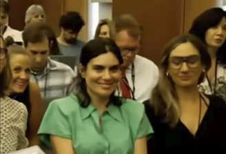 Brittany Romano foi flagrada sorrindo para a câmera durante um julgamento de um assassinato de três crianças nos EUA