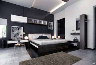 1. O quarto com parede preta faz com que os demais móveis e objetos fiquem em destaque.