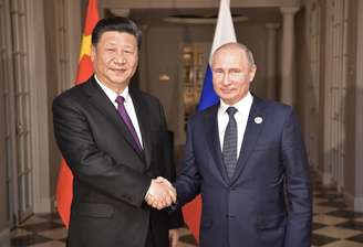 Presidente da Rússia, Vladimir Putin, e presidente da China, Xi Jinping 26/07/2018 Sputnik/Alexei Nikolsky/Kremlin via Reuters