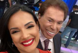 Márcia Dantas e Silvio Santos