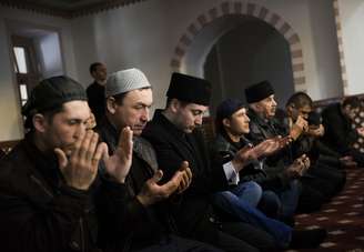 <p>Os tártaros, de confissão muçulmana, representam entre 12% e 15% da população da Crimeia</p>