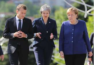 Presidente francês, Emmanuel Macron, premiê britânica, Theresa May, e chanceler alemã, Angela Merkel, em Sófia 17/05/2018 REUTERS/Stoyan Nenov