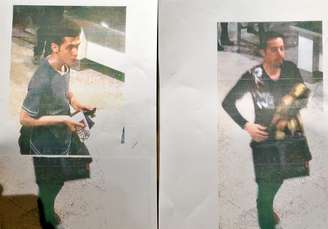 Imagem divulgada pela polícia da Malásia mostra o jovem iraniano de 19 anos e outro homem não identificado que embarcaram no voo da Malaysian Airlines desaparecido desde o final de semana