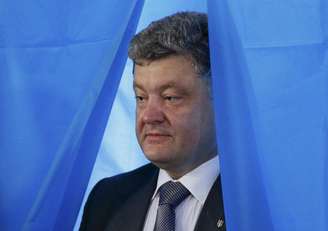 <p>Poroshenko afirmou, nesta quinta-feira, que decidiu assinar o acordo com a União Europeia, ao contrário do que fez seu antecessor, que foi deposto do cargo</p>