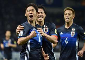 Na primeira rodada da fase de grupos, o Japão venceu a Colômbia por 2 a 1 (JIJI PRESS / AFP)