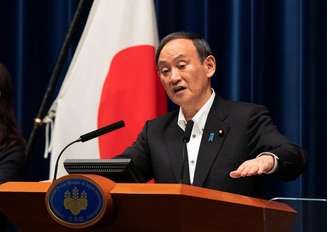 Primeiro-ministro do Japão, Yoshihide Suga, durante entrevista coletiva em Tóquio
07/05/2021 Hiro Komae/Pool via REUTERS