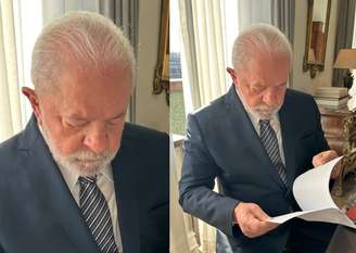  Lula sentado em uma cadeira usando uma grava de grife que ganhou da mulher 