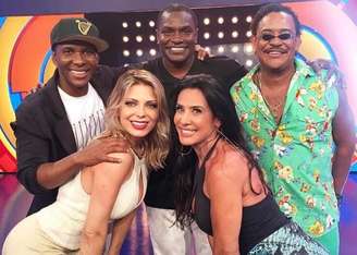 Grupo 'É o Tchan' durante participação no programa de Luciano Huck há alguns anos; grupo vai se apresentar em pocket show no último dia do Rock In Rio 2026