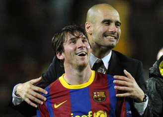 Guardiola e Messi enfrentam-se pela Champions League (Foto: Javier Soriano/AFP)