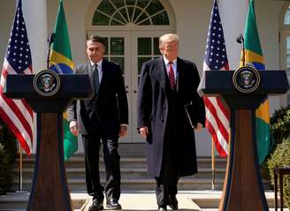 Os presidentes Jair Bolsonaro e Donald Trump durante conferência na Casa Branca, em março de 2019