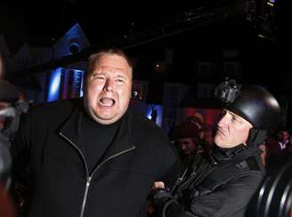 <p>Kim Dotcom, preso em janeiro de 2012, trouxe atores disfarçados de agentes da lei para o lançamento do Mega, em janeiro deste ano</p>