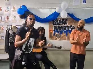 Alunos escolhem Black Pantera como tema de trabalho escolar e recebem visita da banda