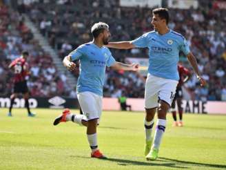 Agüero e Rodri juntos pelo Manchester City (Foto: GLYN KIRK / AFP)
