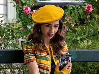 Lily Collins as Emily Cooper, the lead character of the popular Netflix comedy "Emily in Paris." MUST CREDIT: Netflix handout