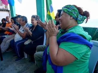 Em primeiro plano, Regina Tchelly, referência internacional em gastronomia sustentável, fundadora do Favela Orgânica no Morro da Babilônia