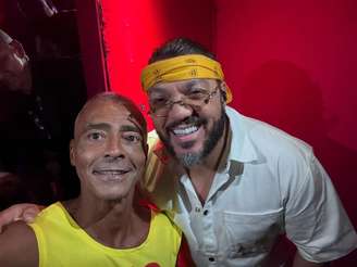 Romário ao lado de Belo