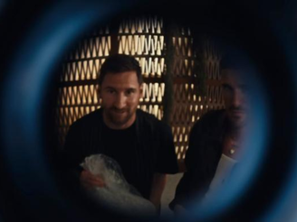 Messi e De Paul em trecho do videoclipe — 