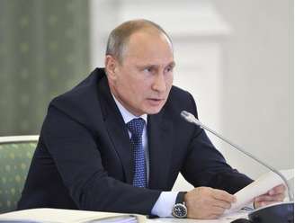 <p>Presidente russo Valdmir Putin é visto durante uma reunião em Kemerovo, na Rússia, na segunda-feira</p>