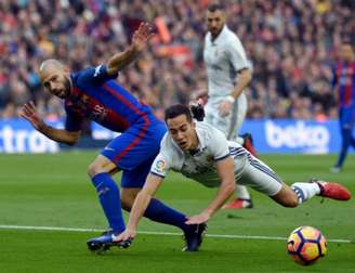 Lucas Vázquez vai desfalcar o Real Madrid (Foto: LLUIS GENE / AFP)