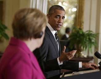 Obama cedeu uma coletiva de imprensa conjunta com a chanceler alemã, Angela Merkel, em Washington