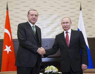 O presidente russo, Vladimir Putin, e seu colega turco, Recep Tayyip Erdogan.
