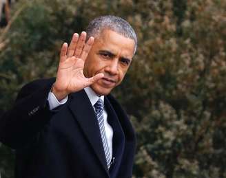 Presidente dos Estados Unidos, Barack Obama, acena enquanto caminha para o helicóptero presidencial na Casa Branca. 21/01/2015