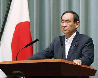 Secretário de gabinete japonês Yoshihide Suga concede entrevista em Tóquio
 14/9/2017   Kyodo/via REUTERS 