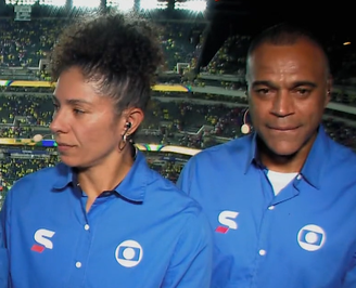 Denilson ao lado de Cristiane na partida