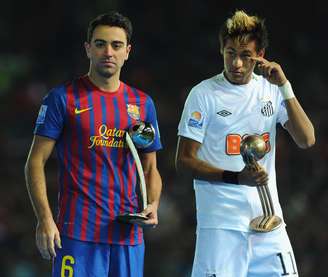 <p>Contra o Barcelona de Xavi, Neymar não conseguiu se destacar em 2011 pelo Santos</p>