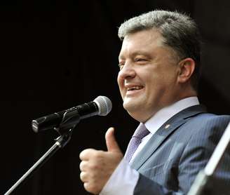 <p><span style="color: rgb(51, 51, 47); font-family: OpenSans, sans-serif; font-size: 18px; line-height: 27px;">O oligarca Petro Poroshenko é conhecido como o "Rei do Chocolate"</span></p>