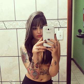 A tatuadora Bruna Barros, de São Paulo, foi a grande vencedora do concurso Miss Tattoo Week, realizado no último domingo (20). Entre os desenhos, Bruna tem uma grande caveira nas costas, uma raposa no pescoço e várias outras tatuagens que ocupam pernas e braços