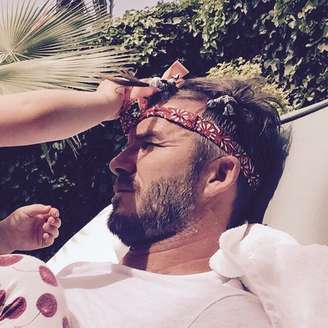 David Beckham posa com penteado feito pela filha Harper Seven