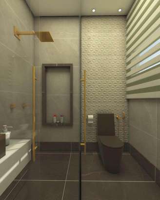 1. Banheiro decorado com chuveiro dourado