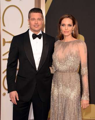 Brad Pitt e Angelina Jolie chegam ao Dolby Theatre, em Los Angeles, para a cerimônia da 86ª edição do Oscar