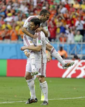 <p>Um dos símbolos do toque de bola espanhol no meio-campo, Xabi Alonso admitiu que time precisa partir mais para o ataque</p>