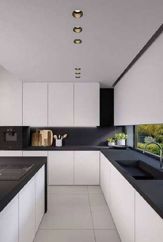 1. Cozinha grande planejada com decoração branco e preto moderna – Foto: Futurist Architecture